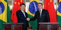 Presidentes da China, Xi Jinping, e do Brasil, Jair Bolsonaro, assinaram nove atos para trabalhos conjuntos sobre investimentos, transporte, saúde, segurança, comunicações e agronegócio