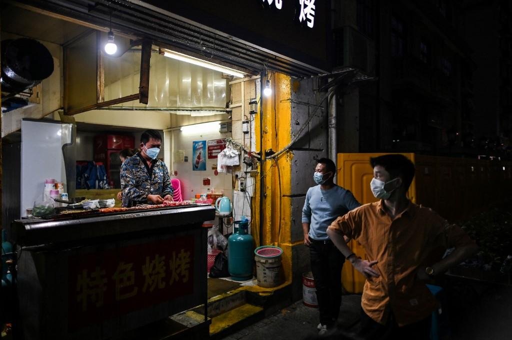 "Mercados molhadores" de Wuhan lutando para lutam para sobreviver ap&oacute;s Covid-19