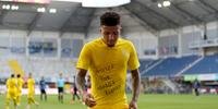 Jadon Sancho, do Borussia Dortmund, usou uma camisa para pedir justiça no caso da morte de George Floyd