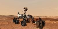 Este arquivo da ilustração da NASA, obtido em 20 de julho, mostra o rover Mars 2020, que usa sua broca para armazenar uma amostra de rocha em Marte