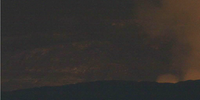 O brilho fraco é visível no Kilauea esta manhã (à noite no Havaí)