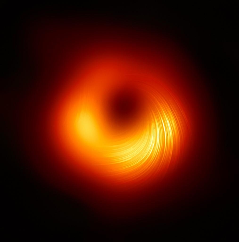 Fotografia de uma simula&ccedil;&atilde;o de um buraco negro feita por um computador