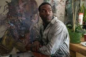 O artista Anthony McCoy (Yahya Abdul-Mateen III) fica obcecado pela lenda urbana do Candyman