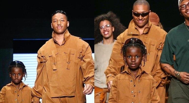 O garoto Bless desfilou ao lado do diretor de imagem Kevin David, amigo da fam&iacute;lia